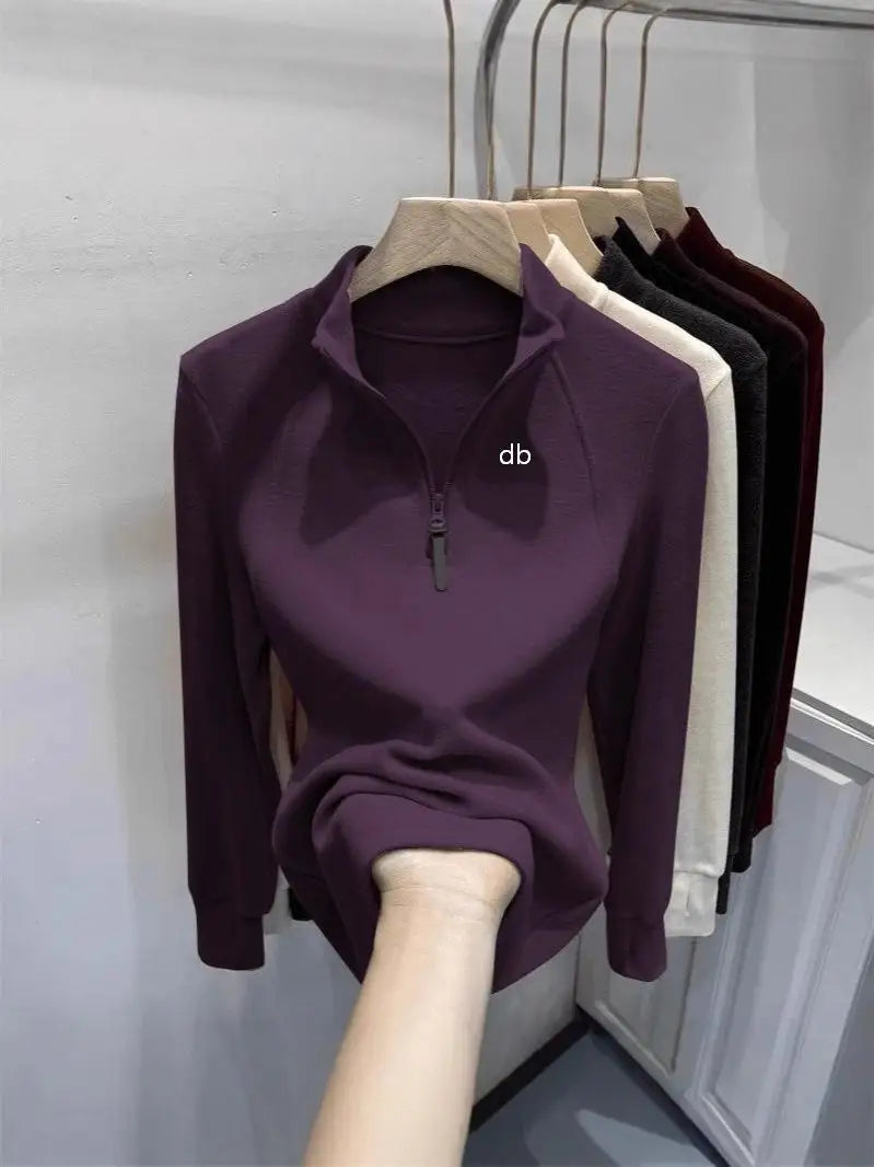 Sweat demi-zip col montant